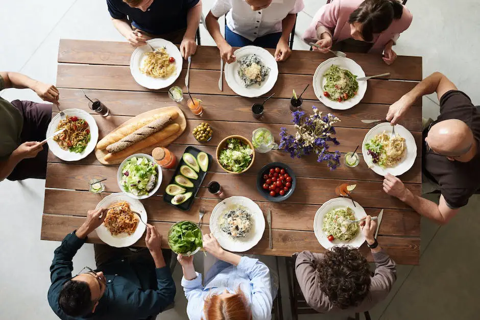 Image depicting a diverse group of children sharing a meal, highlighting the importance of school holiday meal programs in addressing food insecurity among children.